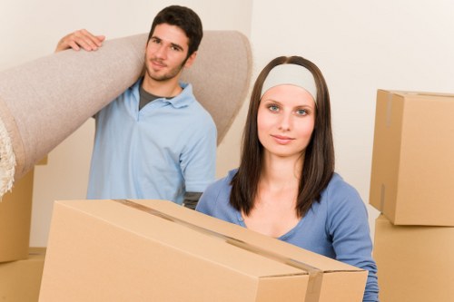 Careful loading of household items by a local van service