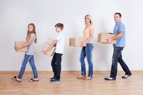 Local mover carrying boxes for a Gunnersbury flat move