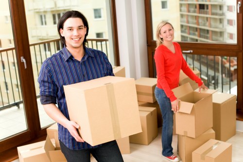 Packed office furniture and equipment ready for local transport